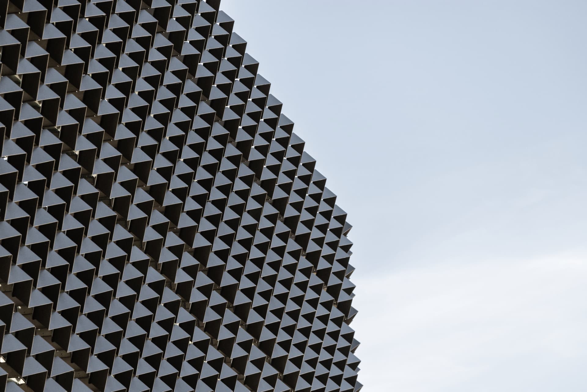 Perforated metal panel in raking light