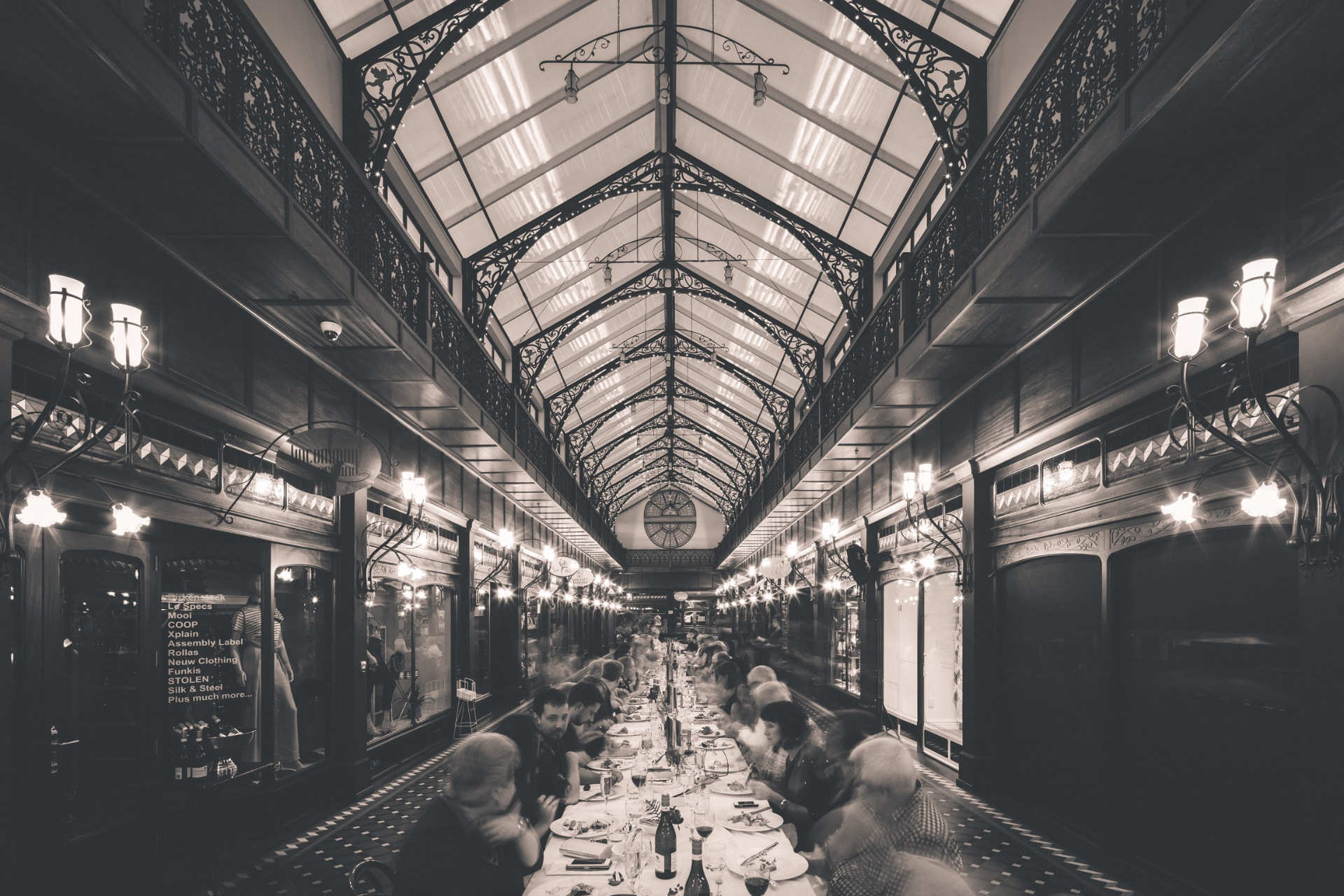 A long dinner table set for an evening together